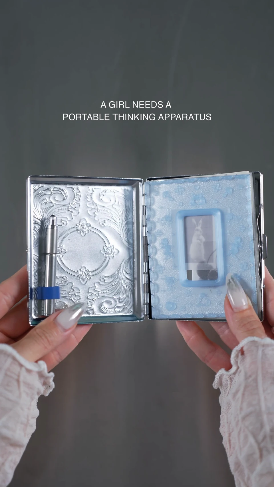 The Portable Thinking Apparatus opens to reveal a notebook and pen