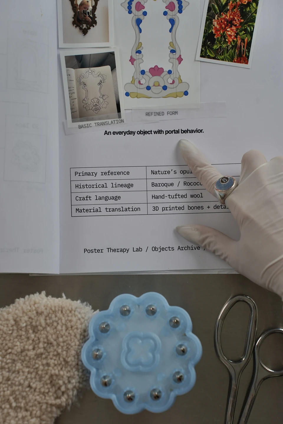 A gloved hand turning a printed Receiver development sheet beside tufting samples, a printed component and scissors.